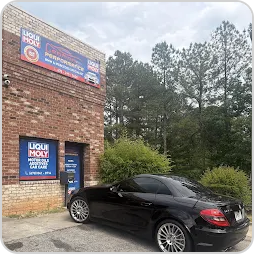 Anan’s black Mercedes outside German Performance