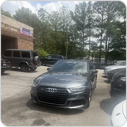 Kayode’s grey Audi outside German Performance